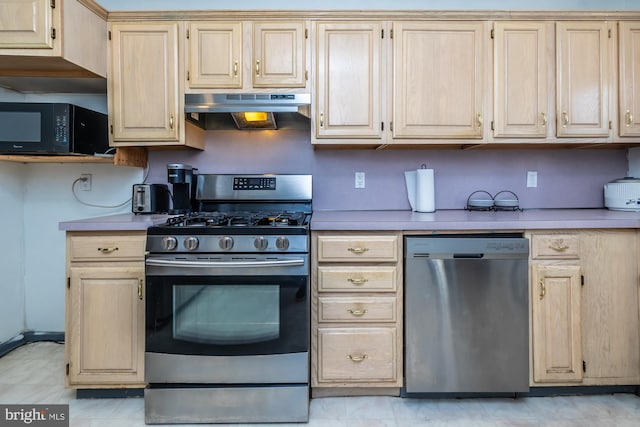 kitchen featuring light brown cabinets, appliances with stainless steel finishes, and extractor fan