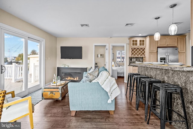 living room featuring dark hardwood / wood-style floors