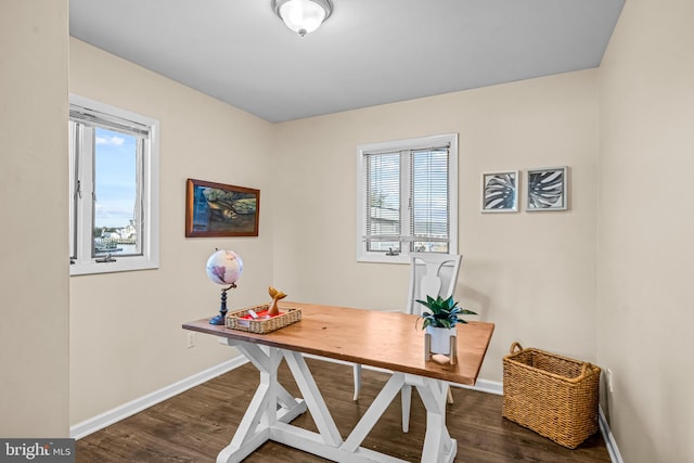 office area with dark hardwood / wood-style flooring and plenty of natural light