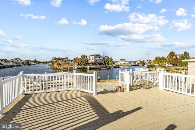 deck featuring a water view