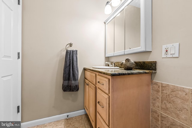 bathroom with vanity and tile patterned floors