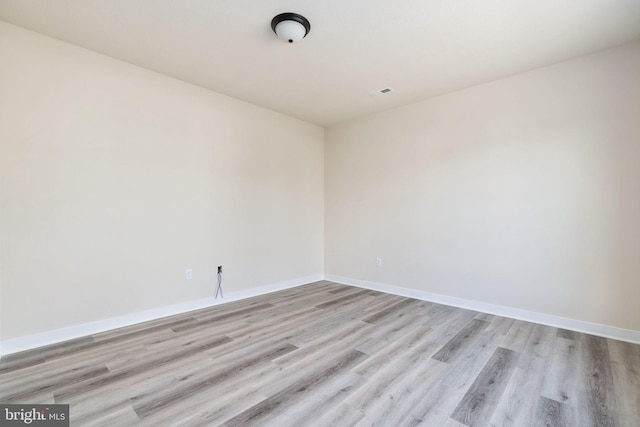 empty room featuring light hardwood / wood-style flooring