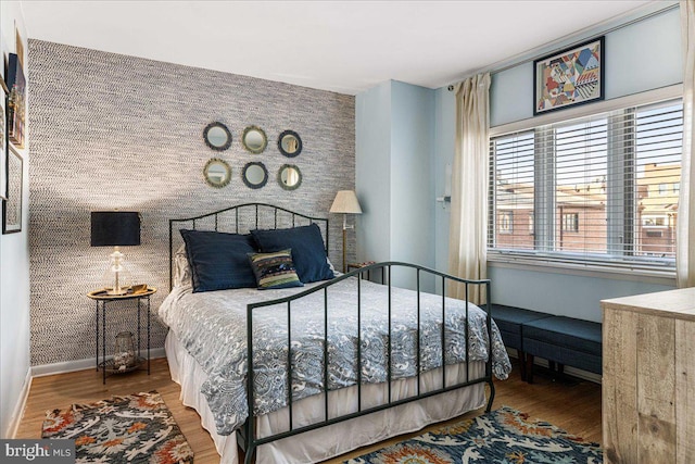 bedroom featuring wood-type flooring