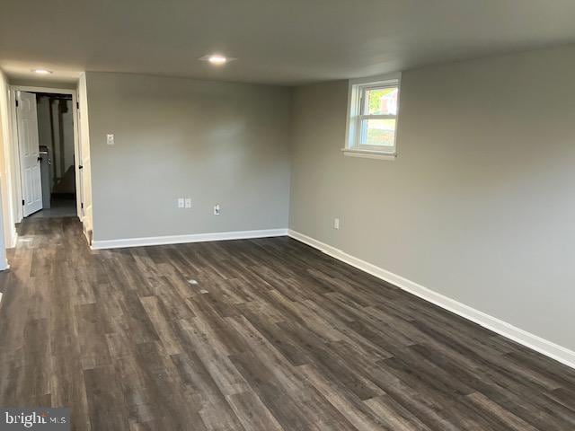 interior space with dark hardwood / wood-style flooring