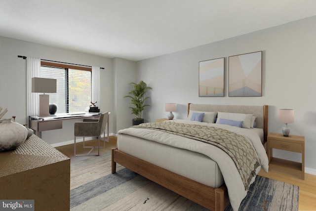 bedroom featuring light wood-type flooring