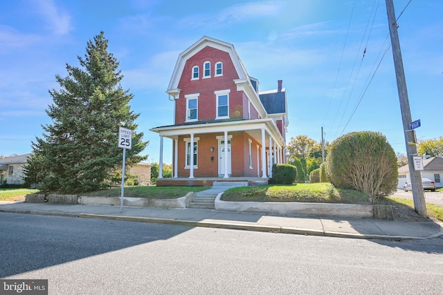 view of front of home featuring covered porch