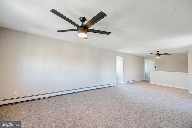 empty room featuring a ceiling fan, light carpet, baseboards, and baseboard heating