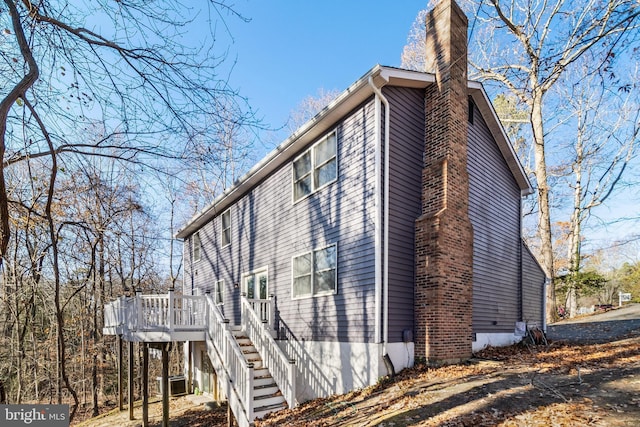 view of home's exterior featuring a deck