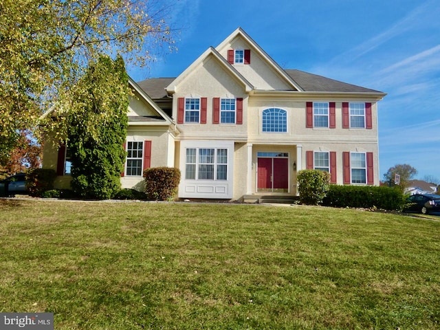 view of front facade with a front lawn