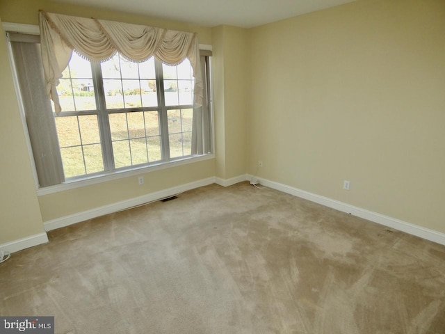 view of carpeted spare room