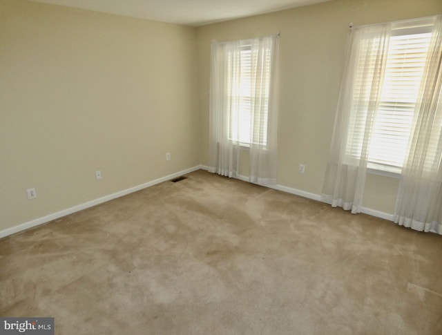 view of carpeted spare room