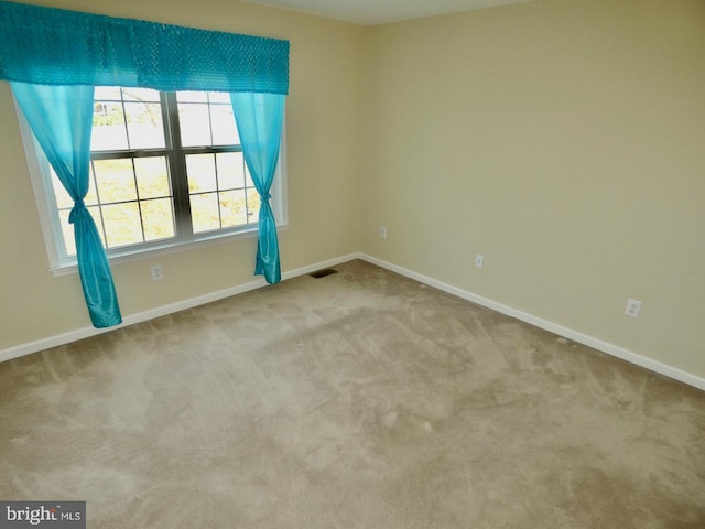 view of carpeted spare room