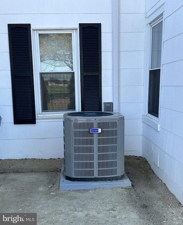 details with central air condition unit and concrete flooring