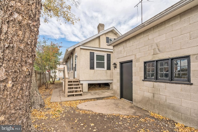 doorway to property featuring a patio