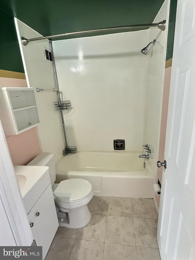 full bathroom featuring tile patterned floors, vanity, shower / tub combination, and toilet