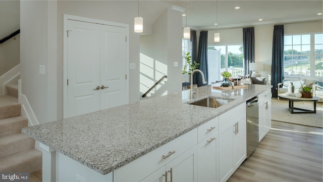 6819 Winterhill Ln, Glen Burnie, MD 21060 - kitchen featuring light stone counters, white cabinets, a sink, and dishwasher
