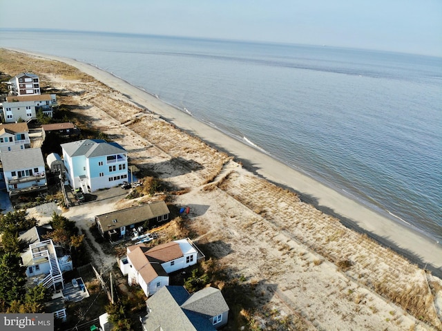 aerial view with a view of the beach and a water view