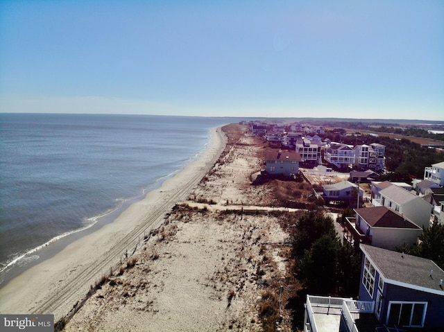 bird's eye view with a view of the beach and a water view