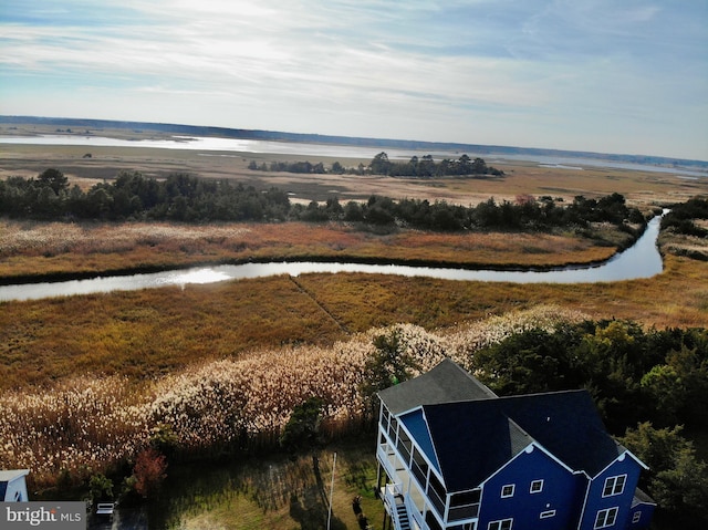 bird's eye view with a water view and a rural view