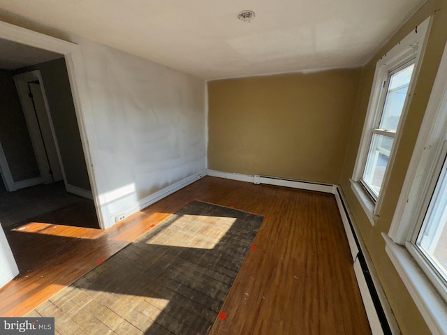 empty room featuring dark wood-type flooring