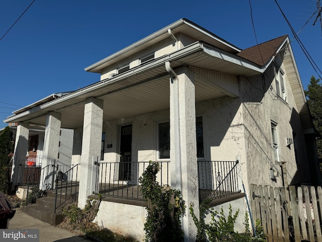 bungalow-style home featuring a porch