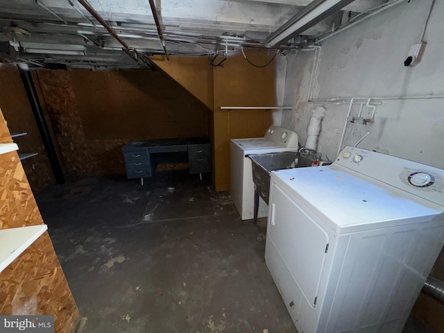 clothes washing area featuring washer / clothes dryer