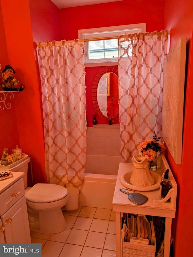 full bathroom featuring vanity, shower / bath combo, toilet, and tile patterned floors