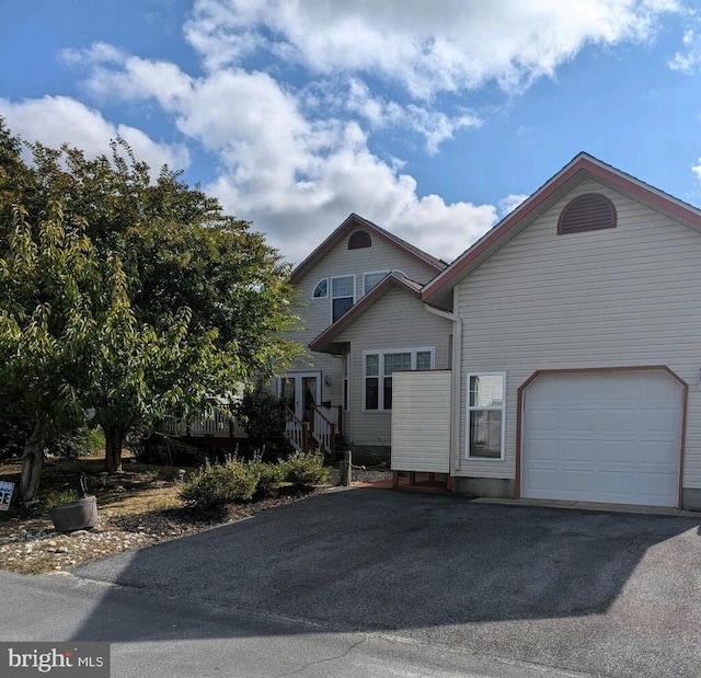 view of front of property featuring a garage