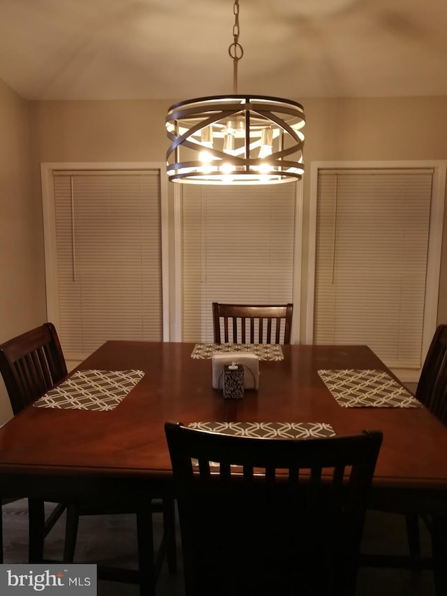 dining room with a notable chandelier