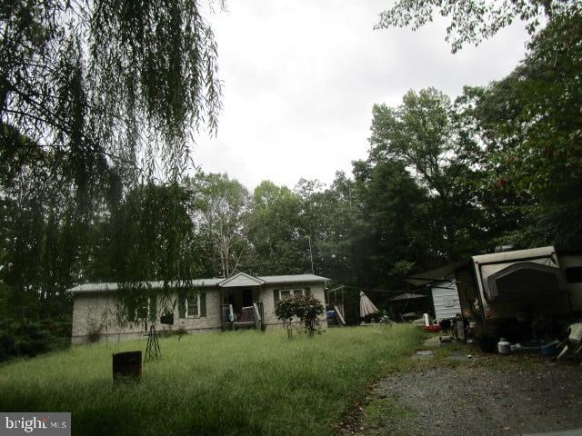 view of front of home with a front lawn