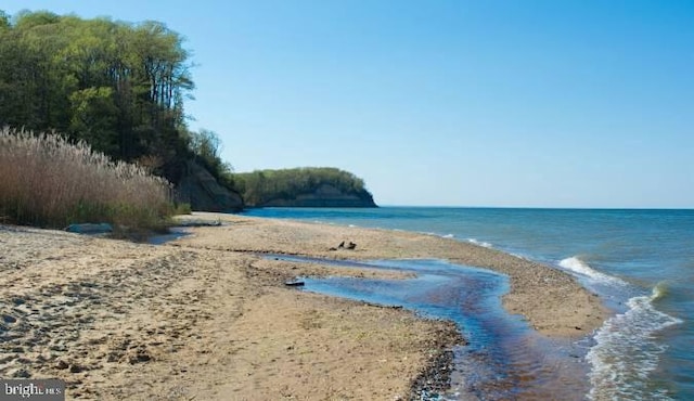 exterior space featuring a view of the beach