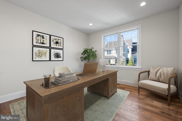 home office featuring dark wood-type flooring