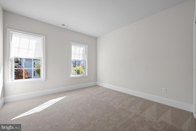 view of carpeted spare room