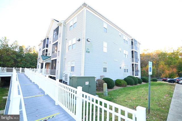 view of property exterior featuring a yard