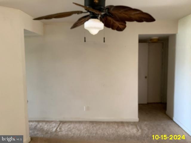 spare room with ceiling fan