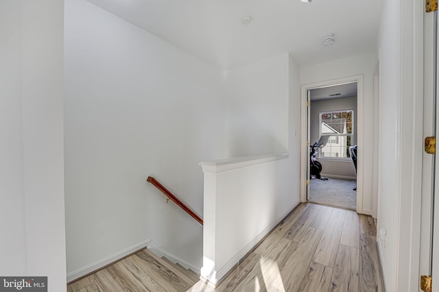 hallway featuring light hardwood / wood-style flooring