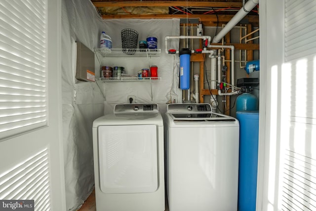 laundry room featuring washing machine and dryer