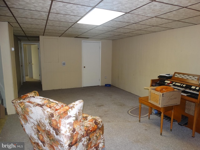 interior space featuring a paneled ceiling