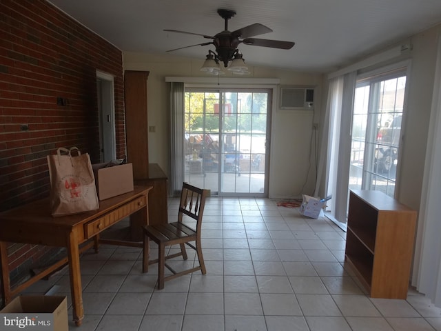 dining room with light tile patterned flooring, a wall mounted air conditioner, and plenty of natural light