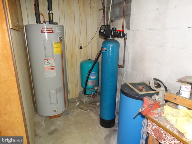 utility room featuring electric water heater