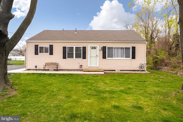 view of front of home with a front lawn