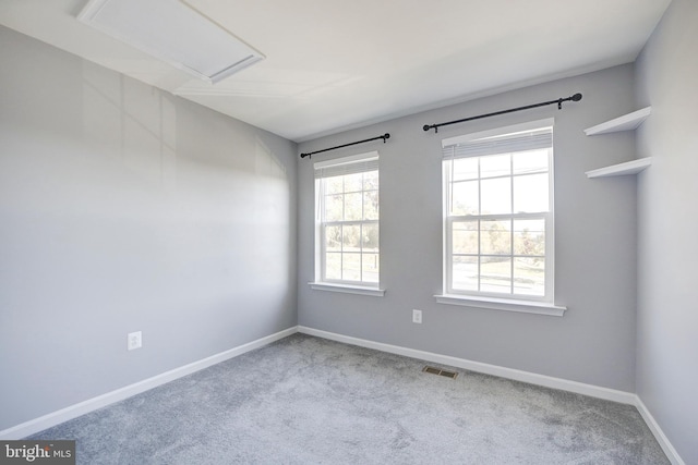 view of carpeted spare room