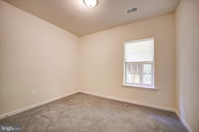 view of carpeted spare room