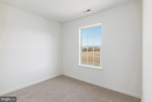 unfurnished room with carpet