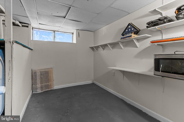 walk in closet featuring a paneled ceiling