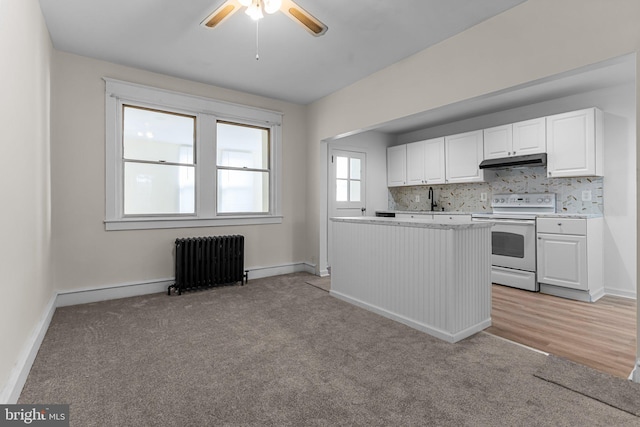 kitchen with white cabinetry, radiator, range with electric cooktop, light hardwood / wood-style floors, and sink