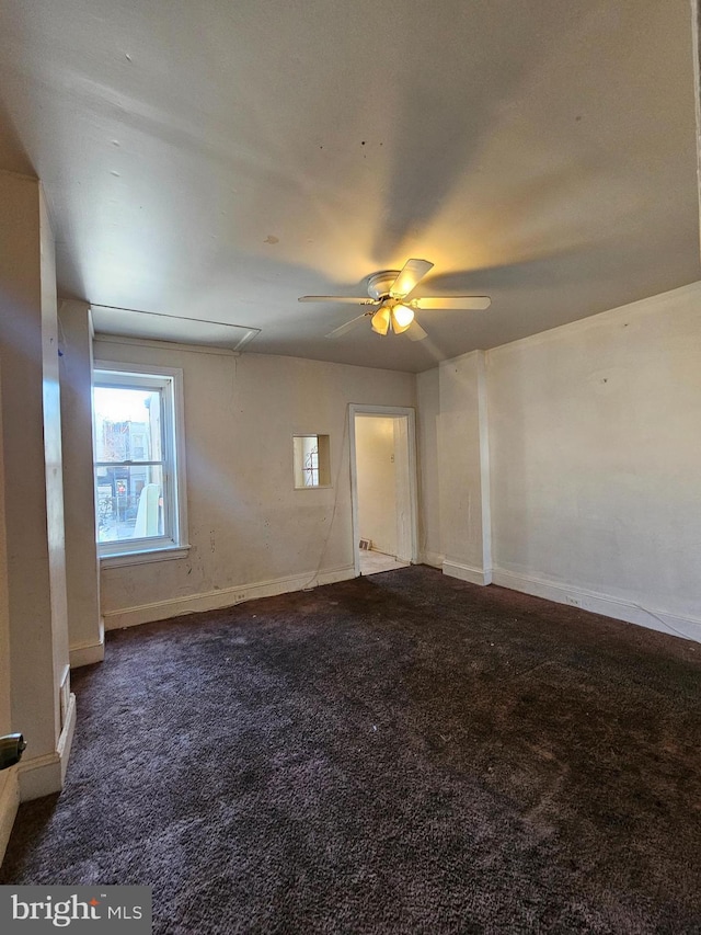 carpeted empty room with ceiling fan