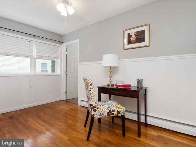 office featuring hardwood / wood-style floors and baseboard heating