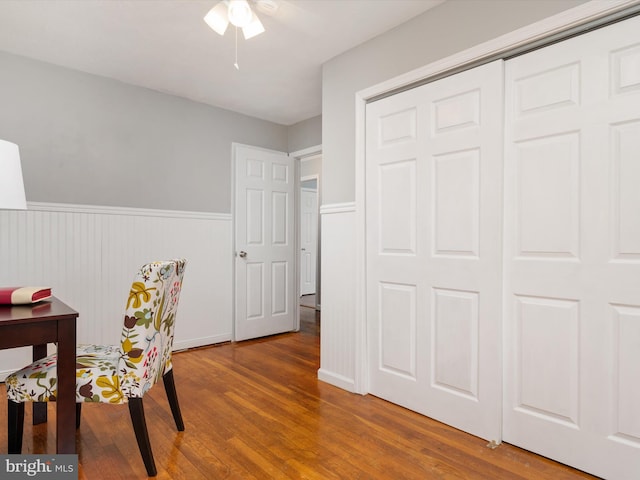 office with ceiling fan and wood-type flooring