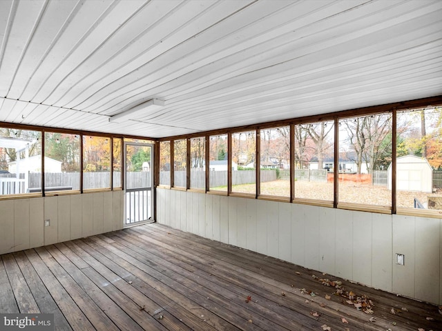 unfurnished sunroom featuring plenty of natural light